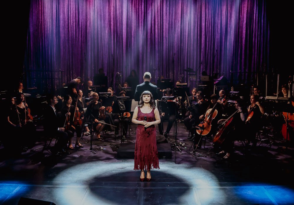 Theatrical Symphony musician on stage during performance